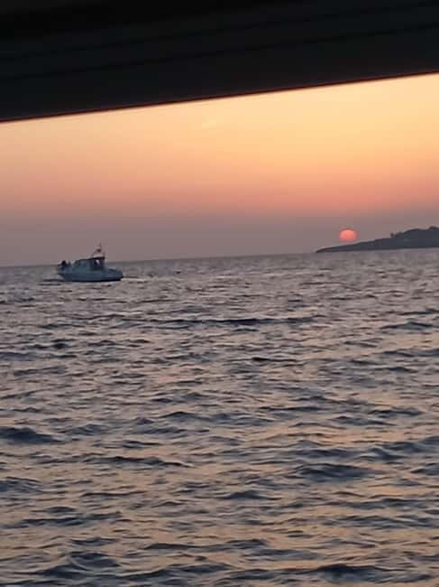 Cascais: Sunset Boat Trip with Welcome Drinks - Costa da Guia cliffs: the best place to watch the sun touch the sea