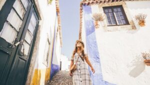 From Lisbon: Day Trip to Porto, Óbidos, and Nazaré - Óbidos’ Walled Streets: Medieval Drama Without the Long Travel