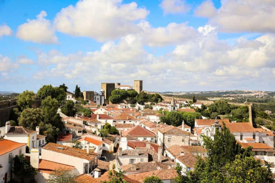 From Lisbon: Fátima, Óbidos, and Nazaré Small Group Day Tour - Nazaré’s Sítio cliffs: big-wave views and the classic sea-town feel