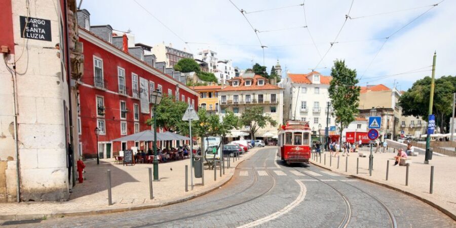 Lisbon: 3-in-1 Hop-On Hop-Off Bus and Tram Tours - Using the audio guide across Belém, Modern, and Hills