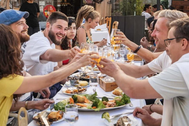 Lisbon: Baixa Food Walking Tour with Drinks - English-speaking guides who connect food to place