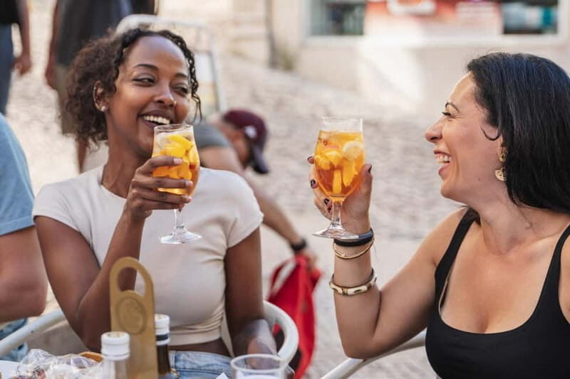 Lisbon: Baixa Food Walking Tour with Drinks - Baixa de Lisboa tastings: presunto, chourico, seafood, and dessert