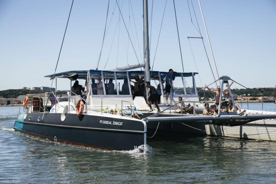 Lisbon: Catamaran Boat Party with Music, Open Bar & Dives - The Party Format: Music, Drinks, and a 3-hour River-to-Ocean vibe