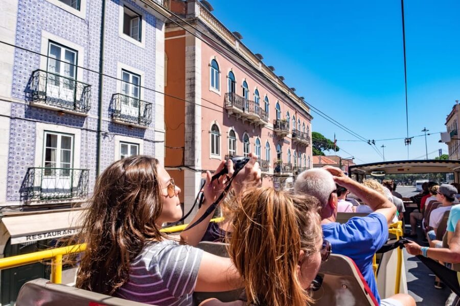 Lisbon: City Sightseeing Hop-On Hop-Off Bus Tour - Audio quality, stop-finding, and weather reality on the top deck