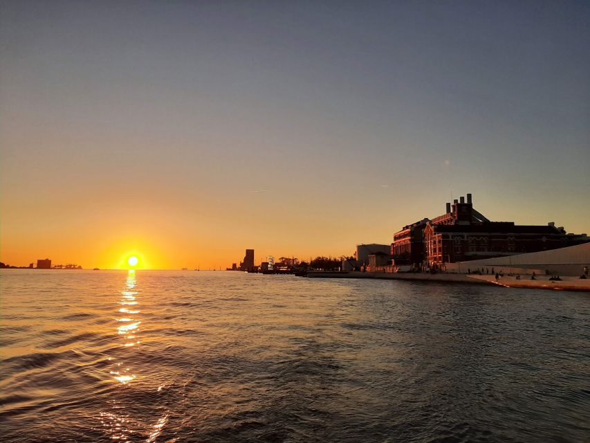 Lisbon: City Skyline Sailboat Cruise with Drink and Snacks - Passing the 25th of April Bridge and crossing to Cacilhas