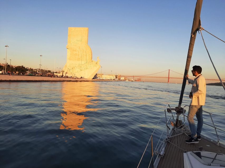 Lisbon: City Skyline Sailboat Cruise with Drink and Snacks - Drinking, snacks, and onboard comfort (including rainy surprises)