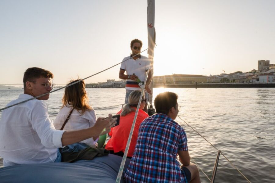 Lisbon: Daytime/Sunset/Night City Sailboat Tour with Drink - On board: what the experience feels like in real time