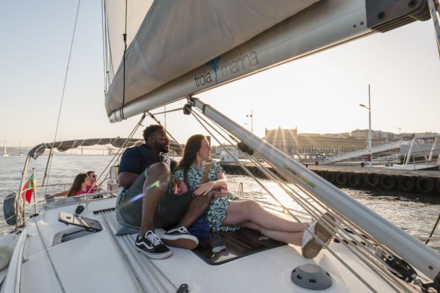 Lisbon: Daytime/Sunset/Night City Sailboat Tour with Drink - City views: Commerce Square, Baixa, São Jorge, Alfama, and more