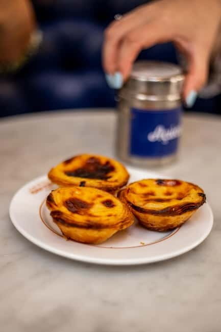 Lisbon: Food Tasting Tour by Tuk Tuk with 2 Stops - Pickup, drop-off, and timing: how to make it painless