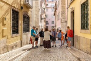 Lisbon: History, Stories and Lifestyle Walking Tour - Bairro Alto: a 16th-century start with a real-world history lesson