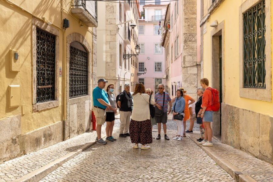 Lisbon: History, Stories and Lifestyle Walking Tour - Bairro Alto: a 16th-century start with a real-world history lesson