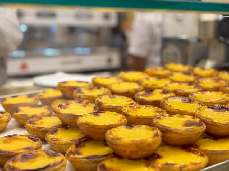 Lisbon: Local Market, Food, and Culture Walking Tour - Mercado da Ribeira stops for real Portuguese breakfast energy