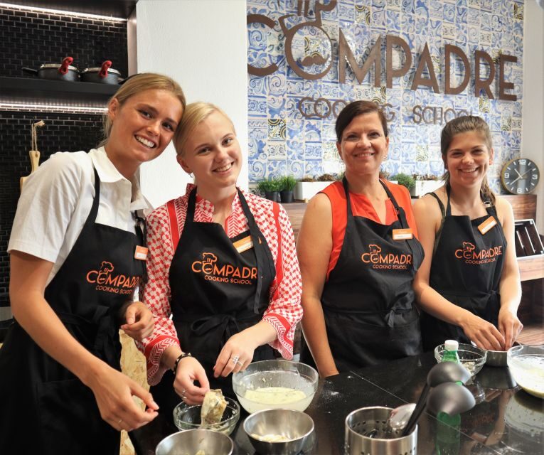 Lisbon: Portuguese Cooking Class for Beginners - Entering the kitchen at Compadre Cooking School (Lisbon)