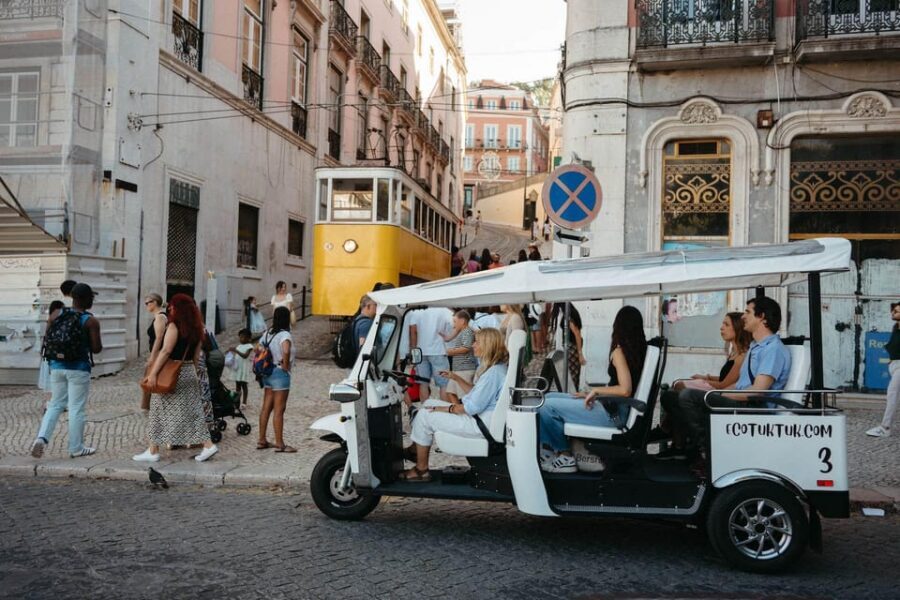 Lisbon: Private Christmas Lights Tour by Eco Tuk Tuk - Chiado and Bairro Alto After Dark: Streets That Feel Like a Movie Set