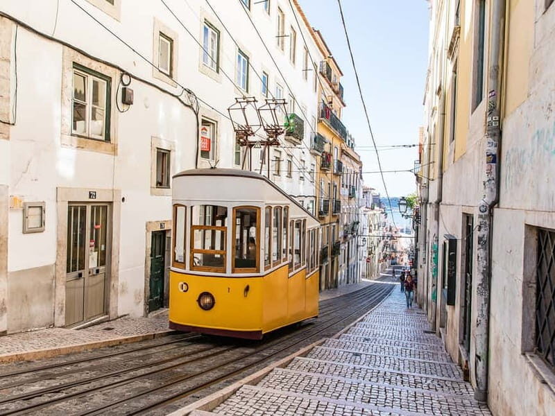 Lisbon: Private Guided Tour by Electric Tuk Tuk - Route walkthrough: Rossio, Lisbon Cathedral, and the jump into old-town views