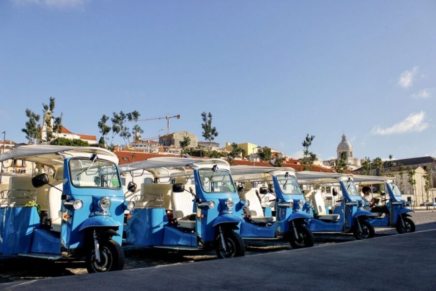 Lisbon: Private Guided Tour of Historical Center by Tuk Tuk - Chiado, Largo de Camões, and the theatre district feel different up close
