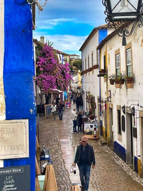 Lisbon: Private Transfer to Porto with stops until 3 cities - Óbidos medieval walls and ginja: the town break people remember