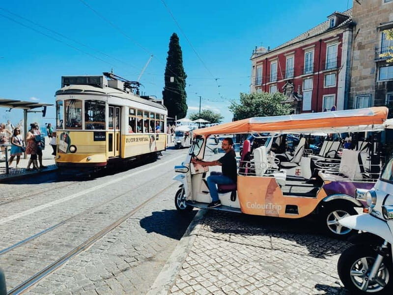 Lisbon: Private Tuk Tuk Tour with Optional Boat Cruise - Premium full day (8 hours): the 25 de Abril Bridge, Costa da Caparica, and a Tagus boat ride