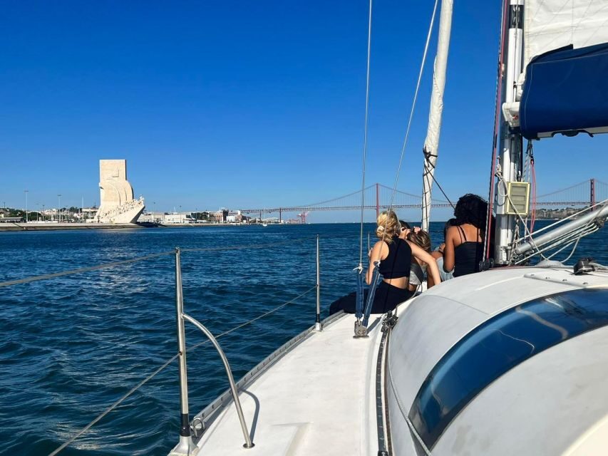 Lisbon: Sailing Sunset - Landmarks on the water: Belém, Praça do Comércio, and the 25 de Abril bridge
