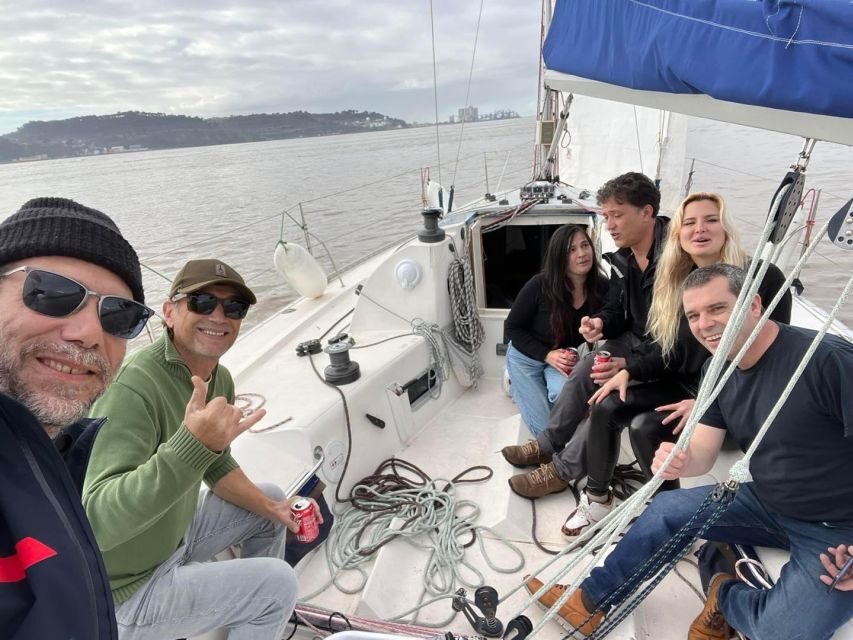 Lisbon: Sailing Sunset - Hands-on sailing and city stories with the crew