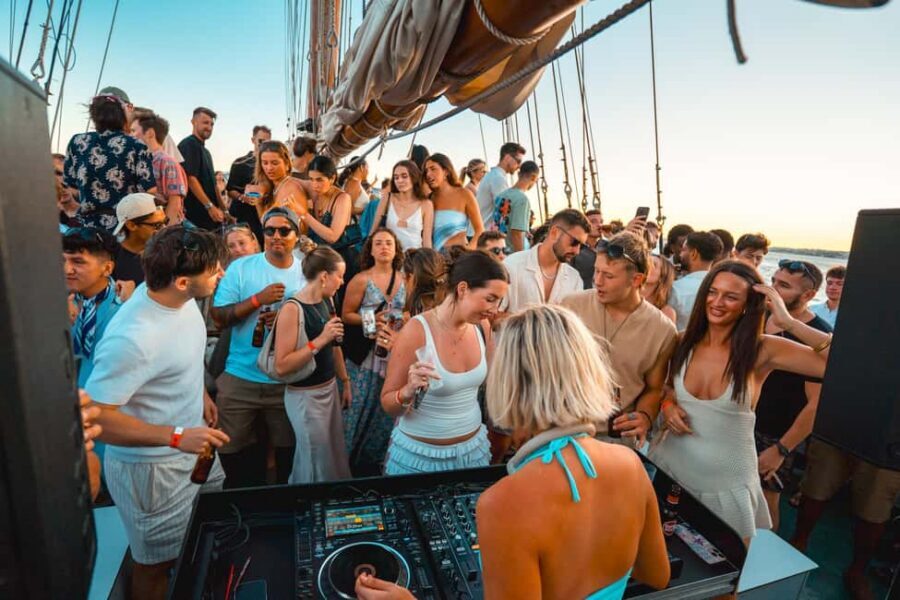 Lisbon: Sunset Boat Party with Live DJ and Night Club Entry - Stop 1: Belém from the water, with classic Lisbon scenery