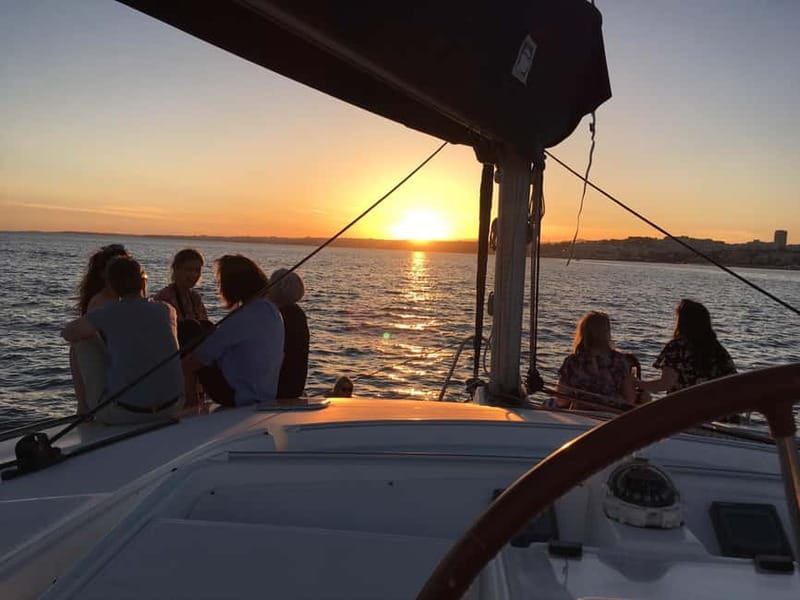 Lisbon: Sunset Catamaran Cruise with Drinks - Boarding at Doca do Espanhol: Blue Skipper Café and Getting Settled