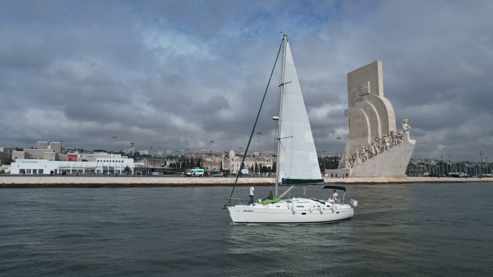 Lisbon: Sunset Cruise on The Tagus River with Welcome Drink - Who the onboard guide is for and what they’ll do with you