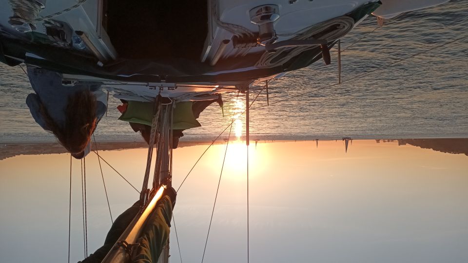 Lisbon: Sunset Cruise on The Tagus River with Welcome Drink - The boat experience: small-group sailing that stays relaxed