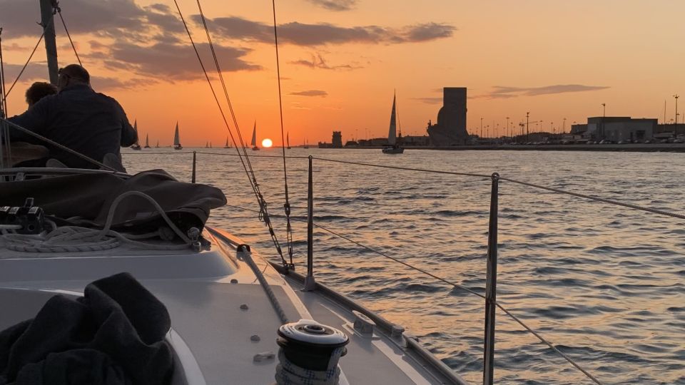 Lisbon: Sunset Cruise with Drinks and Snacks - Belém highlights: Tower, Discoveries, and Jerónimos Monastery in river light