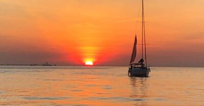 Lisbon: Sunset Cruise with Drinks and Snacks - The dock, the sailboat, and what boarding feels like