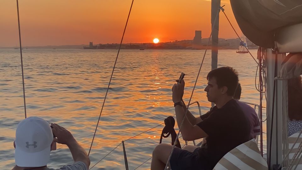 Lisbon: Sunset Cruise with Drinks and Snacks - Passing under the 25 de Abril Bridge: the cruise’s biggest wow factor
