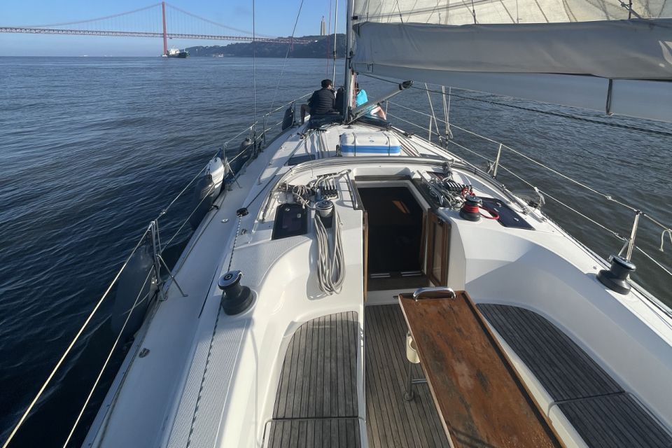 Lisbon: Sunset Sailing Boat Cruise with Wine - Alfama and Almada: the neighborhoods that feel most alive