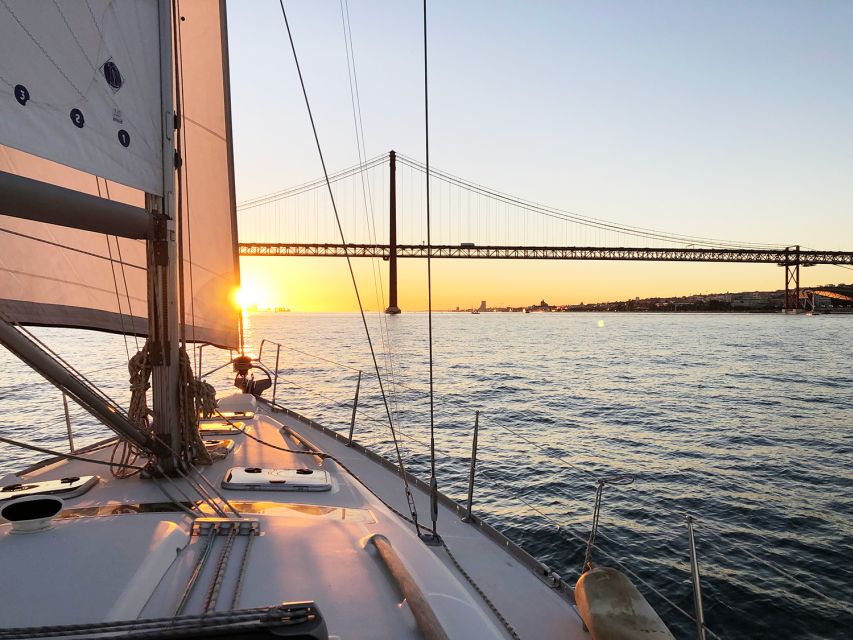 Lisbon: Tagus River Sunset Cruise with Drinks - Belem Tower and the Discoveries Coast: where the day turns into legend