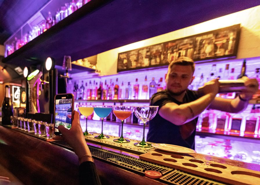 Lisbon: Tipsy Tour Fun Bar Crawl with a Local Guide - Five Portuguese drinks and shots: beer, cocktail, and the fun part