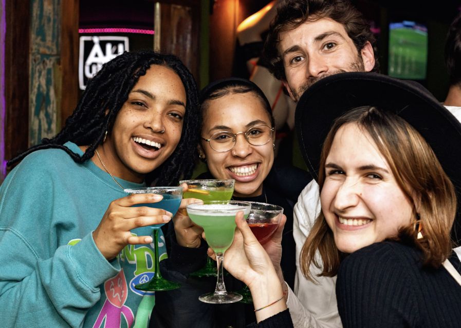 Lisbon: Tipsy Tour Fun Bar Crawl with a Local Guide - Bairro Alto after dark: walking the streets with real Lisbon stories