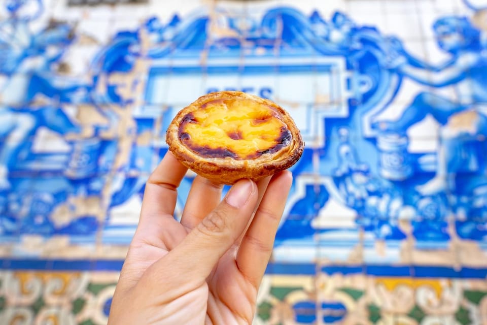 Lisbon: Walking Tour, Belém Neighborhood, Tram and Boat Ride - Praça do Comércio: where the city meets the river