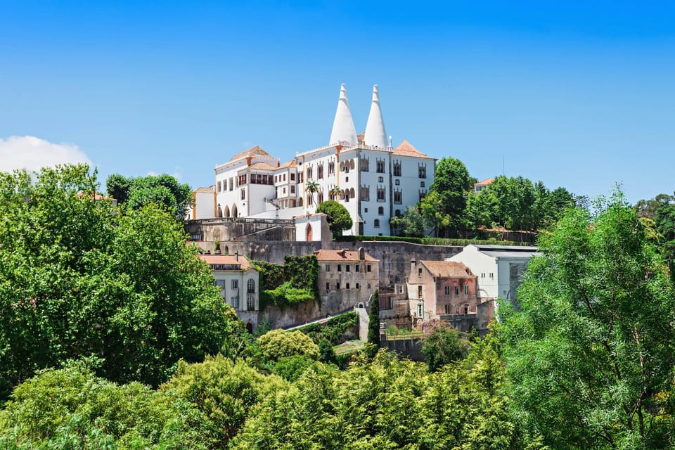 National Sintra Palace E-Ticket and Audio Guide - Inside the palace: Swan Room, Manueline highlights, and the theatrical rooms