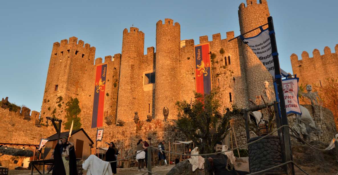 Óbidos: Medieval Tales & Secrets Spots Guided Walking Tour - First sip in Óbidos: Ginjinha on chocolate, not on a whim