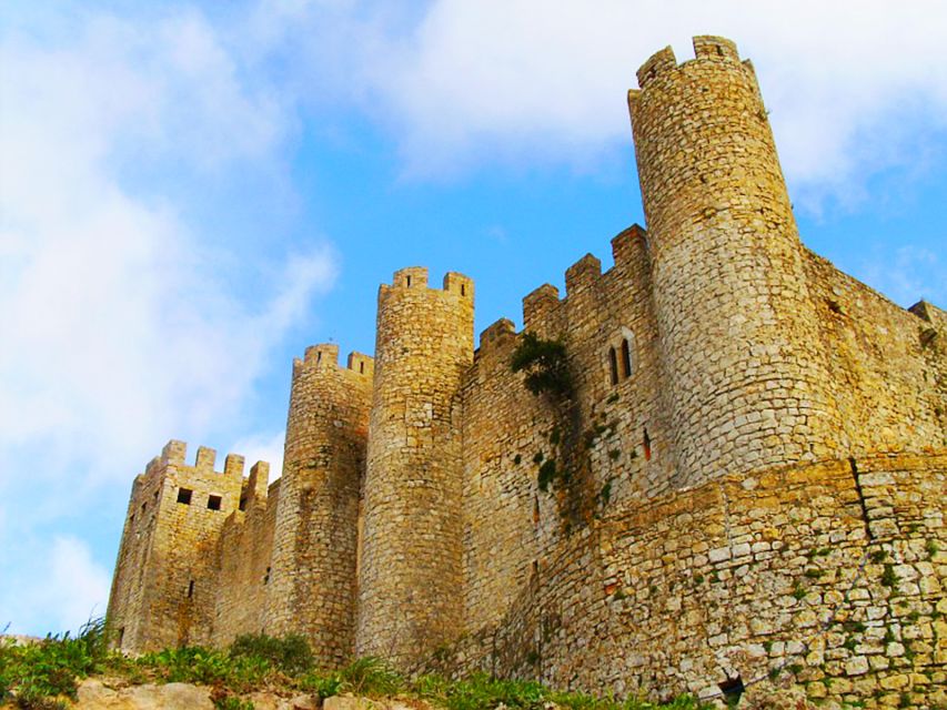 Óbidos, Nazaré & Alcobaça: Private Trip by Car - Óbidos inside the castle walls: medieval streets, wall views, and ginjinha
