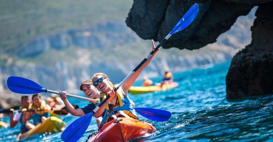 Sesimbra: Arrábida Natural Park Guided Kayaking Tour - Sea caves and those limestone cliffs: the view that changes every minute